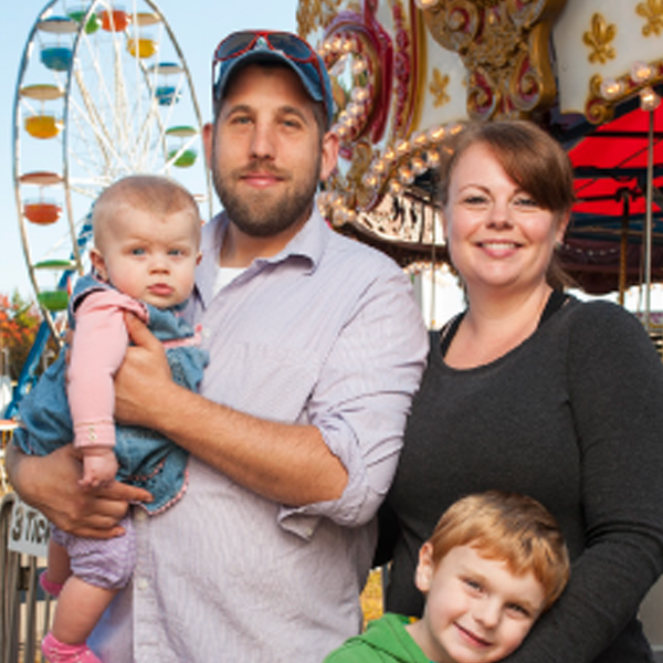A family at a state fair in New Hampshire