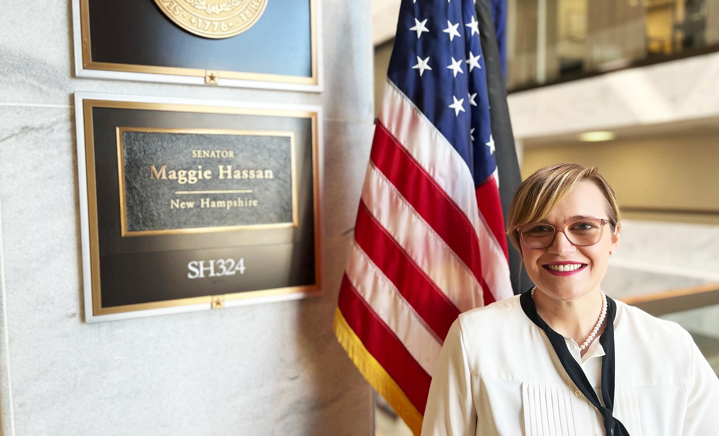A photo of Master of Public Administration alum Brittany Matthews outside of Sen. Maggie Hassan's office