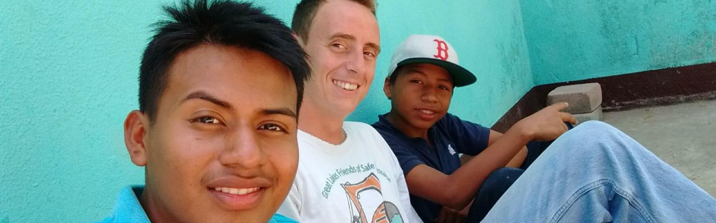 Americorps member with some local children.