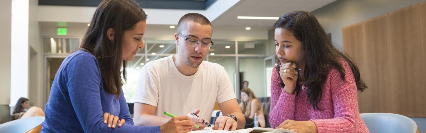 Students discussing graduate school partners. Students discussing graduate school partners.