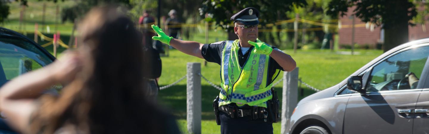 Photo of a police officer directing traffic