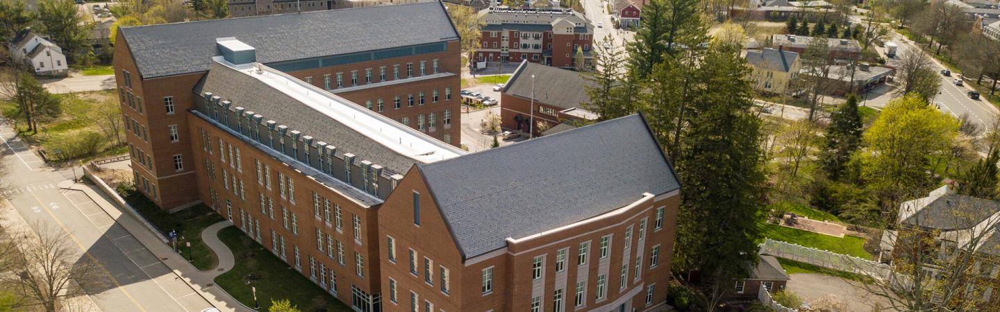 A photograph showing Paul College at UNH, from which S. Melvin Rines graduated from