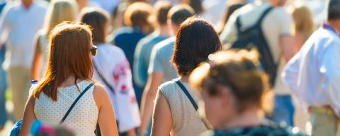 large group of people walking outside