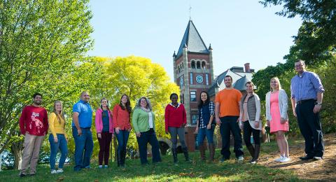 Group of students standing in front of Thompson Hall at UNH.