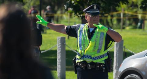 Photo of a police officer directing traffic