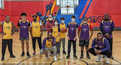 MPA alumni Derek Thompson '23G with youth student-athlete mentorship group