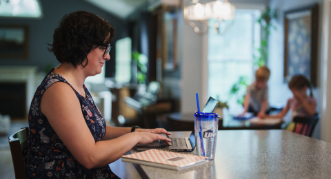 online executive masters student on computer