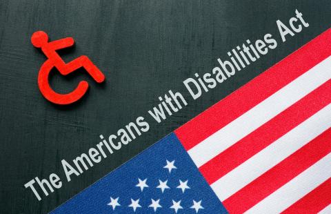 image of american flag and wheelchair along with words the americans with disabilities act