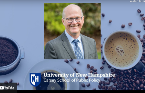 UNH president James Dean infront of coffee background