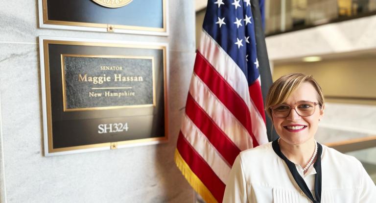 A photo of Master of Public Administration alum Brittany Matthews outside of Sen. Maggie Hassan's office