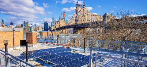 Solar panels near a bridge