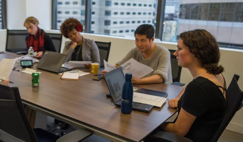 continuing education students city at a table