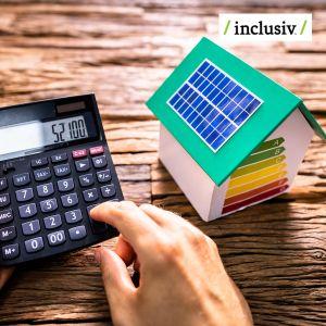 person hand with calculator and green model home