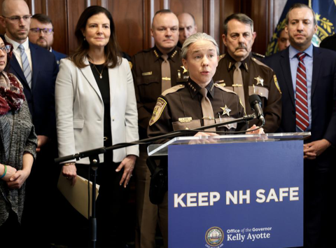  MPA alum Kathryn Mone speaking at a press conference