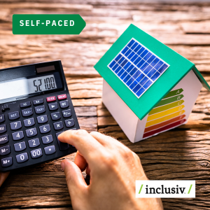 a persons hand using a calculator with a model house next to it