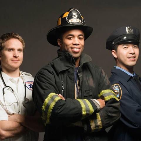 An image showing three first responders: a paramedic, a firefighter, and a police officer