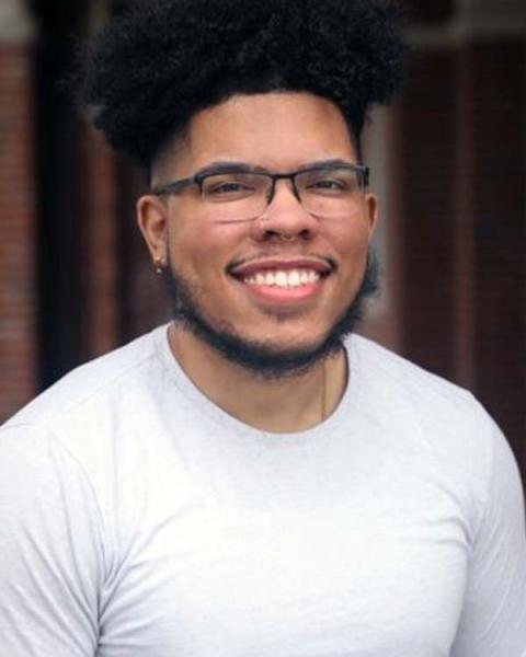A photograph of Kevin Pajaro-Mariñez, a fellow with NH Listens and the Assistant Director of Equity and Inclusion at Phillips Exeter Academy